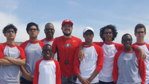 group and coach in uniform