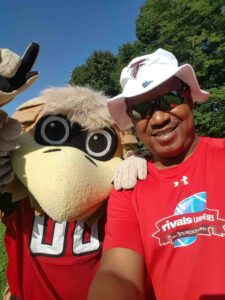 man and sports mascot