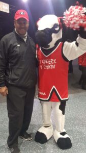 coach and cow mascot