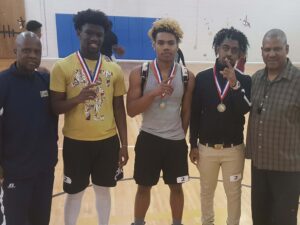 coach and team with medals