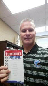Coach_Nichols_of_PC_with_TSAP[1]
