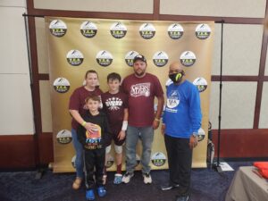 GBA_-_Coach_Brown_with_family_2021[1]